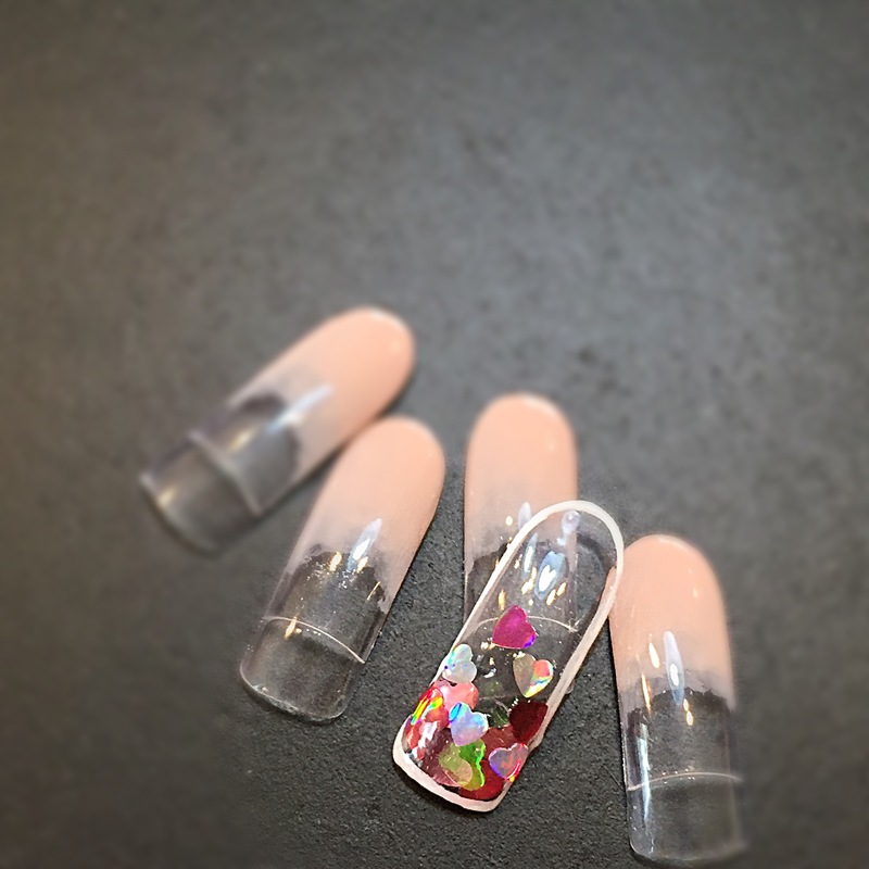 クリア×ハートホロ埋め尽くしネイル。