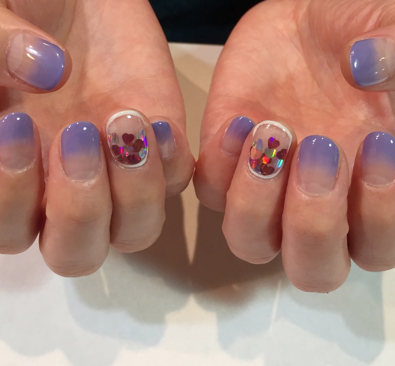 クリア×ハートホロ埋め尽くしネイル。